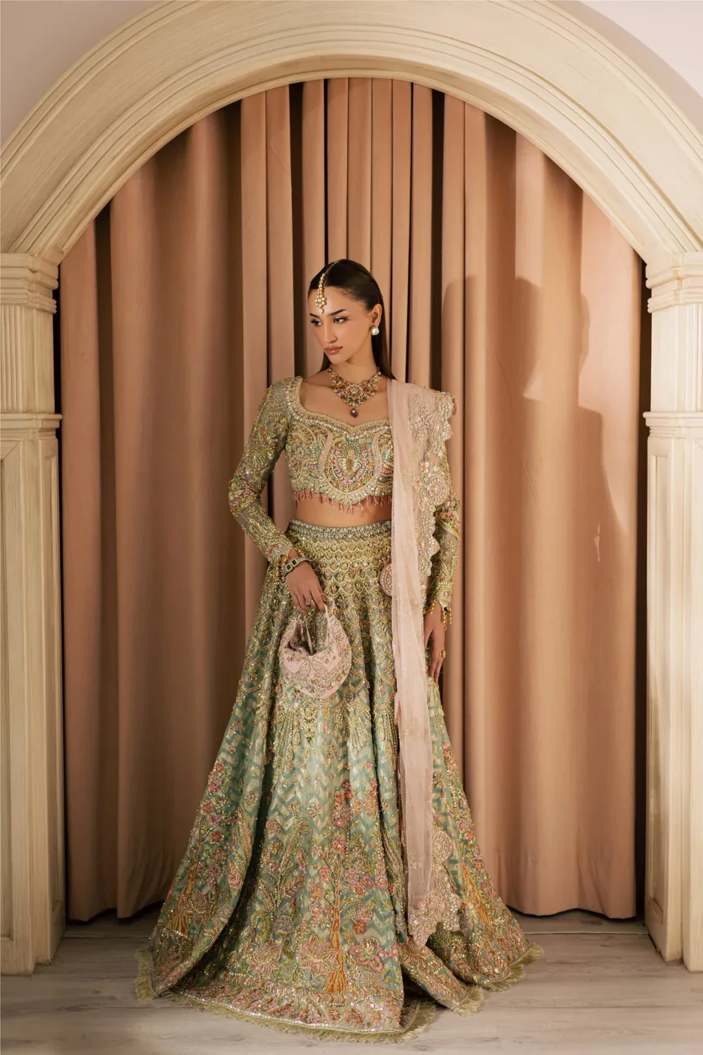 Kashaf five-piece Bareeze net bridal ensemble with organza potli